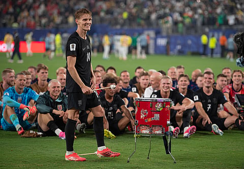 Norway captain Martin Ødegaard leads the celebration after their win over Senegal