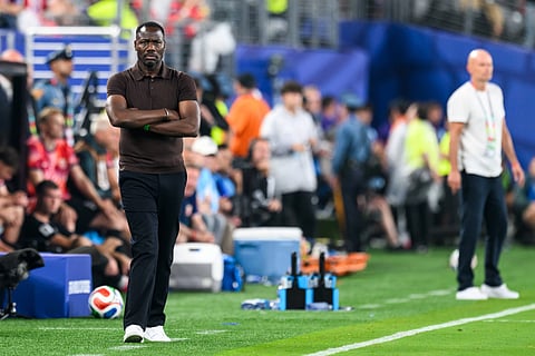 Pape Bouna Thiaw on the touchline against Norway