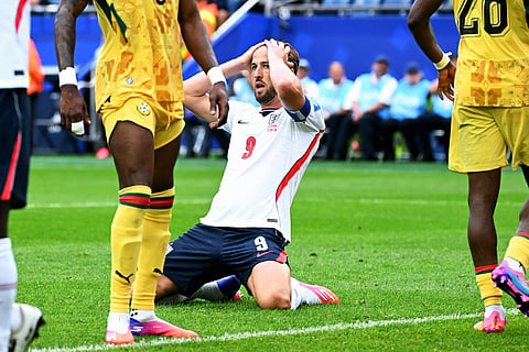 Harry Kane reacts after missing an opportunity against Ghana