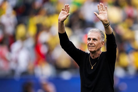 Carlos Queiroz waves to the fans after their gritty 0-0 draw with England