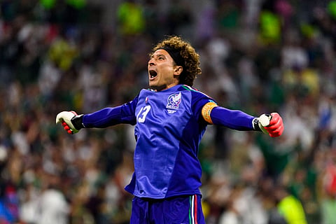 Guillermo Ochoa celebrates as Mexico beats Czech Republic