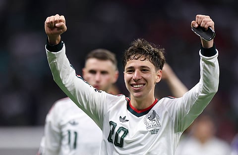 Mateo Chavez celebrates after scoring the opening goal for Mexico