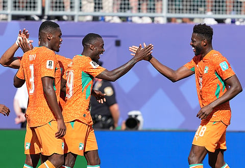 Ivory Coast players celebrate their goal against Curacao