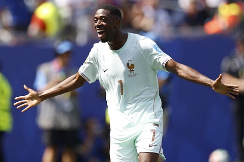 Ousmane Dembele celebrates after scoring his second goal against Norway 