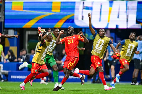Yoane Wissa celebrates his goal against Uzbekistan