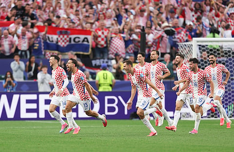 Croatia players celebrate their winning goal against Ghana