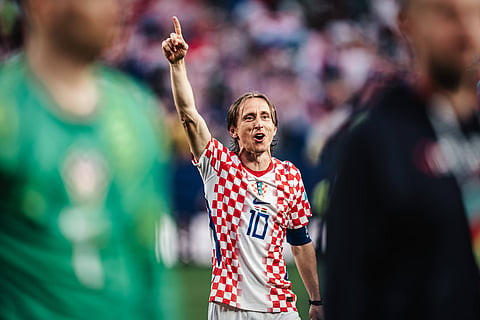 Luka Modric celebrates after their win over Ghana 