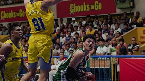 SPARK. AJ Sacayan sank a corner triple that sparked the University of the Visayas Green Lancers’ breakaway in the fourth.

