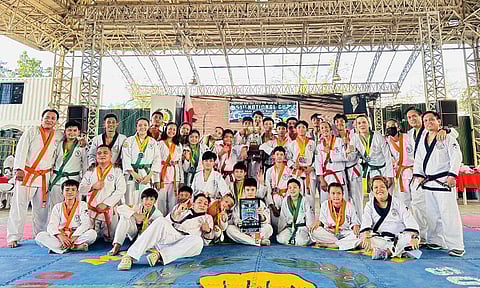OVERALL CHAMPS. The Blue Warrior Club of Davao City defends its overall championship trophy in the recently concluded 51st National Moo Kwan Soo Bahk Do Gup Classing Championship Tournament held at Matina Town Square (MTS).  