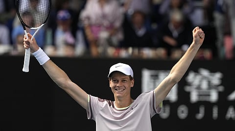 Jannik Sinner of Italy celebrates after defeating Novak Djokovic of Serbia in their semifinal at the Australian Open tennis championships at Melbourne Park, Melbourne, Australia, Friday, Jan. 26, 2024. 