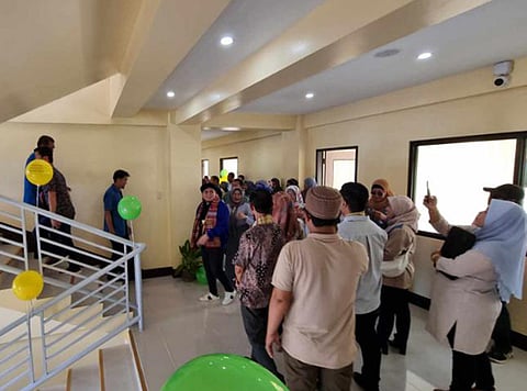 ZAMBOANGA. The Ministry of Basic, Higher and Technical Education in the Bangsamoro Autonomous Region in Muslim Mindanao (MBHTE-Barmm) has completed the construction of a P38 million two-story building to serve as the new schools division office in Bongao, Tawi-Tawi. A photo handout shows MBHTE officials and personnel checking the interior of the building during its inauguration on Tuesday, January 23.