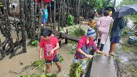 Waters in the Bunawan River in Davao City on Tuesday morning, January 16 have overflowed to residents nearby, reaching almost canal-deep due to the heavy rain last night.