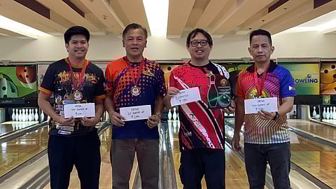 BEST FOUR. The Datba January 2024 monthly finals tournament winners, from left, fourth-placer Rodrigo Tongo II, runner-up Art Galendez, champion Marc Fernandez, and third-placer Ulysses Caturan receive their prizes at the SM Lanang bowling center held on Sunday, February 4, 2024. 