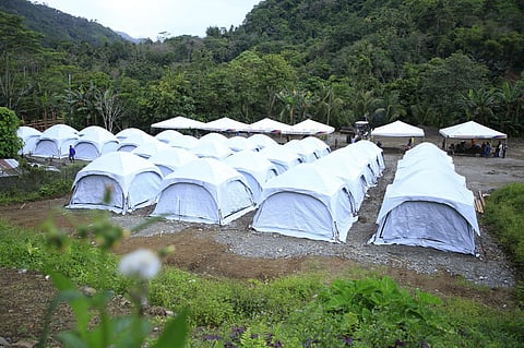 TEMPORARY SHELTER. The Provincial Government of Davao de Oro is currently constructing the temporary shelter to the families affected by the Masara Landslide. Around 67 tents from the Philippine Red Cross were erected on Tuesday, February 27, 2024 at the Quasai Parish in Barangay Elizalde, Maco. The installation was spearheaded by thr personnel from the Provincial Engineering Office, PDRRMO and other personnel to finish the installment of more than 100 tents allocated in the area.