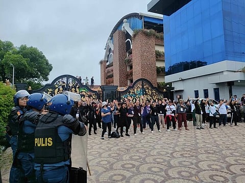 'PASTOR APPOLO C. QUIBOLOY, INNOCENT!' Members and workers of the Kingdom of Jesus Christ (KOJC), led by embattled Pastor Apollo Quiboloy, gathered outside the KOJC compound in Davao City on Monday morning, June 10, to show support for their leader facing sexual and human trafficking charges.