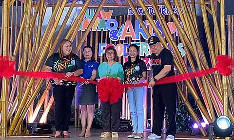 Duaw Davao TOURismo Arts and Food Trucks Bazaar was officially opened on Thursday, June 27, 2024, at Rizal Park, San Pedro Street, Davao City. The bazaar is open to the public until June 30, from 10 a.m. to 10 p.m., featuring local food concessionaires, art exhibitions from local artists of Davao Artist Federation Inc., and a special exhibition of sculptures by the Museo Dabawenyo. The opening was graced by Jennifer Romero, officer-in-charge of the Davao City Tourism Operations Office (left), Councilor Pilar Braga (center), Donna Sarong of Museo Dabawenyo (second from right), and Victor Navales, president of Dabawenyo Artists Federation Inc. (right).
