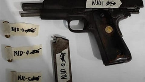 ZAMBOANGA. Lawmen arrest one of the most wanted persons in the Bangsamoro Autonomous Region in Muslim Mindanao (BARMM) in a law enforcement operation in Lanao del Sur on Monday, July 15, 2024. A photo handout shows the caliber .45 pistol, magazine assembly with three pieces of ammunition the lawmen seized from the arrested most wanted person identified only as alias Papi. (SunStar Zamboanga)
