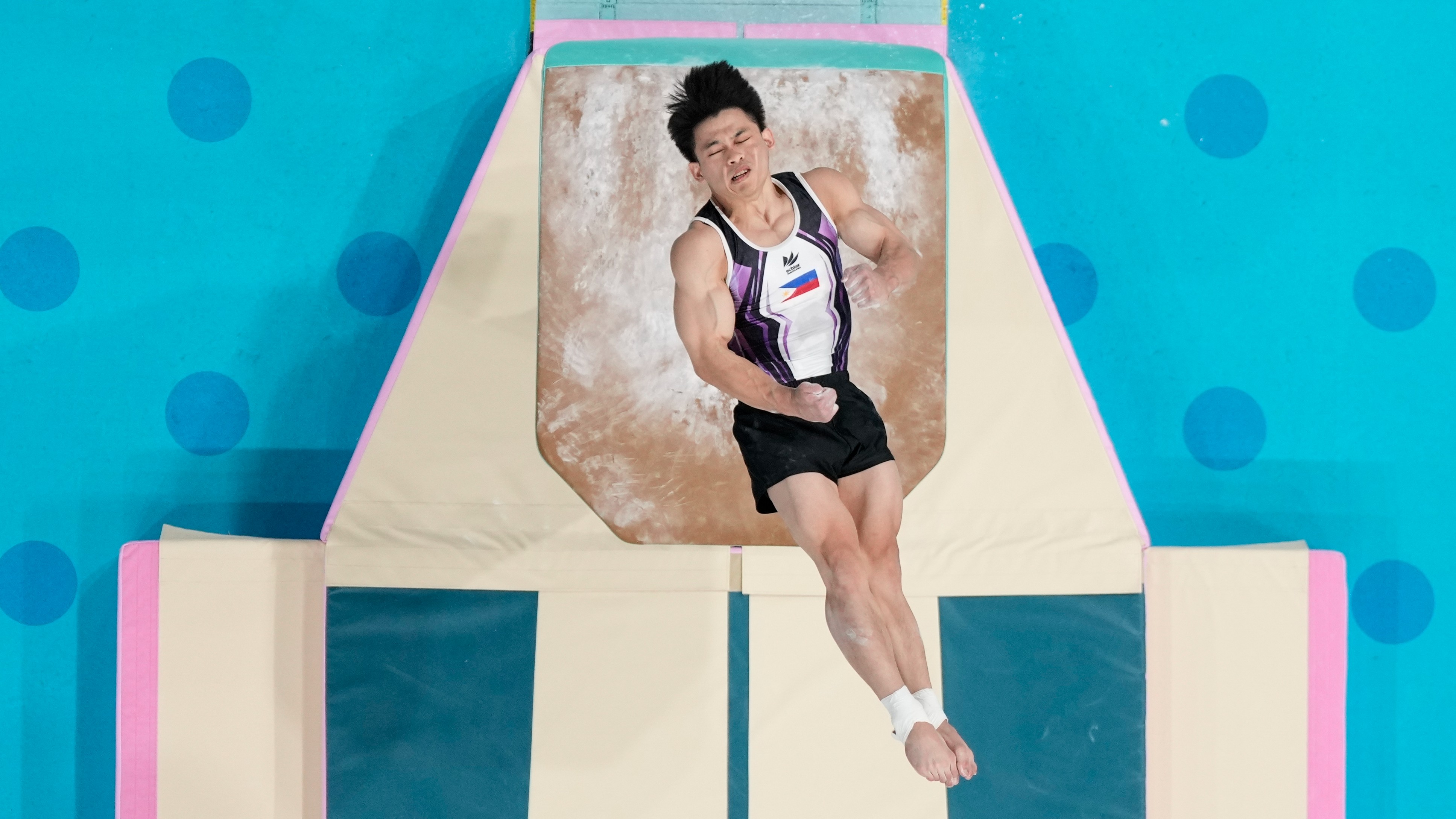 FINALS-BOUND. Carlos Edriel Yulo of the Philippines performs on the vault during a men's artistic gymnastics qualification round at the 2024 Summer Olympics, Saturday, July 27, 2024, in Paris, France.
