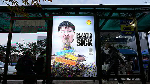 SOUTH KOREA. A display board shows a call for a reduction in plastic production during the fifth session of the Intergovernmental Negotiating Committee on Plastic Pollution, at a taxi station in Busan, South Korea, Saturday, November 30, 2024.