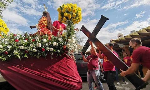 The Ihos del Nazareno pulled the vehicle carrying the statue of the Black Nazarene outside the Sta. Ana Shrine Parish for a procession along Sta. Ana Avenue, Davao City, in celebration of the feast of the Black Nazarene on Tuesday afternoon, January 9, 2024.