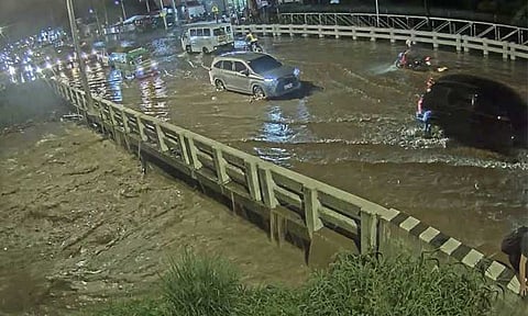 The Balusong Bridge in Davao City was impassable due to the Davao River overflow brought about the heavy rain on Saturday evening, January 4, 2025.