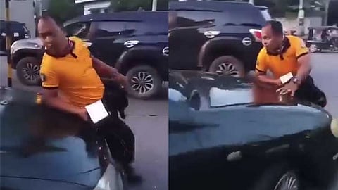 A screenshot of the viral video captures a driver in Davao City nearly running over a CTTMO officer who was trying to stop the vehicle to issue a traffic violation ticket on January 11, 2024. Davao City Police Office (DCPO) will file multiple criminal charges against the driver.
