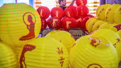 A WORKER arranges lanterns on Thursday, Jan. 23, 2025, that will be installed in parts of Chu Un Temple, a Buddhist temple on V. Rama Ave. in Cebu City, for the Chinese New Year, which will be celebrated on Wednesday, Jan. 29. / 