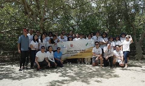 Volunteers from Cebu Pacific, SMBC Aviation Capital, and RAFI plant mangrove seedlings and clean the coasts of Sitio Sulok, Lian, Batangas, on Feb. 28, 2025, as part of an initiative to restore coastal ecosystems and promote environmental sustainability.
