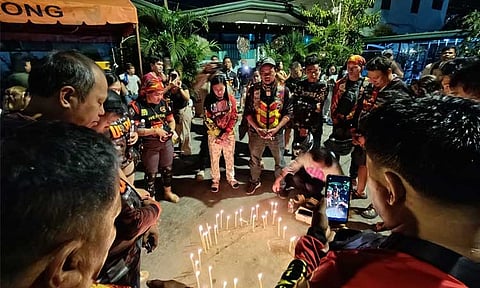 Supporters of Former President Rodrigo Duterte show support outside his residence through offering prayer and candle lighting on Friday, March 14, 2025, at Doña Luisa, Davao City.