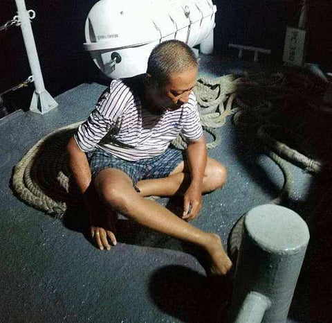 ZAMBOANGA. Troops aboard BRP-Jose Loor Sr. (PC-390) of the Philippine Navy rescue 26 of the 32 passengers of a wooden-hulled vessel that sank on the waters of Tawi-Tawi on Sunday, March 16. A photo handout shows one of the rescued passengers seated aboard PC-390 after they were rescued. 

