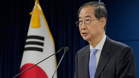 South Korean acting President Han Duck-soo speaks during a briefing at the Government Complex in Seoul, South Korea, Monday, March 24, 2025. (AP)