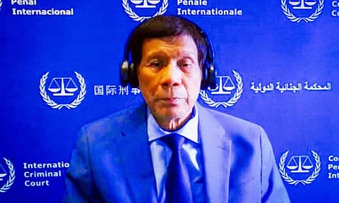 Former Philippine President Rodrigo Duterte is seen on a screen in the courtroom of the International Criminal Court (ICC) in The Hague, Netherlands, Friday, March 14, 2025.
