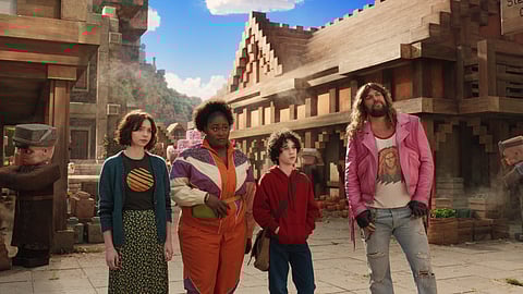(From left) Emma Myers as Natalie, Danielle Brooks as Dawn, Sebastian Eugene Hansen as Henry, and Jason Momoa as Garrett, in #MinecraftMovie, now showing in cinemas. 

