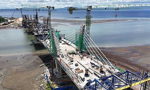 The Department of Public Works and Highways (DPWH) reported that the Bucana Bridge Project, also known as the Davao River Bridge Project which is a part of the Davao Coastal Road, is now 80 percent complete.