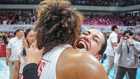 Brooke Van Sickle and MJ Phillips share an emotional embrace after powering the Petro Gazz Angels to a historic triumph over the Creamline Cool Smashers in their do-or-die clash for the PVL All-Filipino crown Saturday at the Philsports Arena.