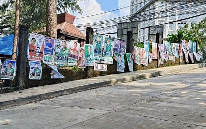 Officials to poll candidates: Clean up, repurpose campaign tarps
