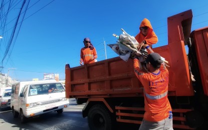 'OPLAN BAKLAS'. The “Oplan Baklas” team of Commission on Elections 11 (Davao Region) hauls campaign materials that were illegally placed along Claro M. Recto Avenue on March 28, 2025. Comelec Chairperson George Garcia on Tuesday (May 6) said there are 30 to 35 candidates in the May 12 elections, among them a senatorial bet, who will face disqualification cases due to alleged illegal campaign materials. (PNA photo by Robinson Niñal Jr.)