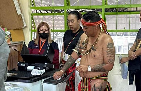 BAGUIO. Nicole and Igor Nikolai cast their votes dressed in traditional attire at the Baguio Sped Center in Baguio City on Monday, May 12, 2025. 
