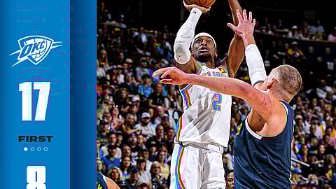 SHAI RISING. Oklahoma City Thunder guard Shai Gilgeous-Alexander takes a jump shot over Denver Nuggets center Nikola Jokic in the first half of Game 4 in the Western Conference semifinals.  / 