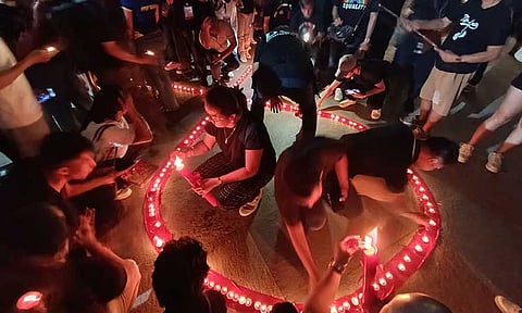 Volunteers, civil society members, and government officials gathered at Rizal Park, Davao City, on the evening of May 23, 2025, to light candles in a solemn ceremony raising awareness on HIV/AIDS.