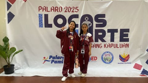 CHAMPION DUO. Elementary girls blitz chess players Alexie Timkang, left, and Hannah Segara deliver Davao Region’s first gold medal in regular sports on Day  2 of the 2025 Palarong Pambansa in Ilocos Norte, Monday, May 26.