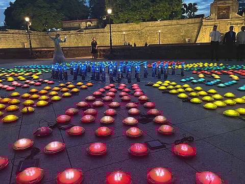 Photo during the unveiling of Blue Lantern climate artwork.