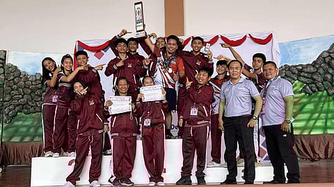 OVERALL WUSHU CHAMPIONS. The Davao Region’s wushu athletes celebrate their overall championship after clinching four gold medals and two bronzes in the 2025 Palarong Pambansa held at the Sarrat Civic Center in Ilocos Norte on Thursday, May 29. 