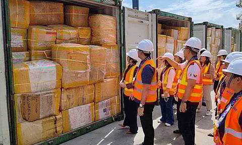 DMW, BOC return ‘abandoned’ balikbayan boxes to owners 