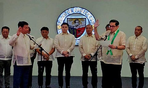 Mayor Noel Villanueva (left) administers the oath of office of Senator-elect Bam Aquino at the Concepcion town hall in Tarlac on Friday morning, May 30, 2025. Photo by Chris Navarro