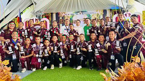 GOLDEN FINISH FOR THE EAGLES. The Davao Eagles’ elementary boys’ football team cap off Davao Region Athletic Association’s (Davraa’s) 2025 Palarong Pambansa campaign with a thrilling 5–4 shootout victory over Western Visayas, clinching the gold medal in the championship match on Saturday, May 31, in Ilocos Norte. Also in photo is Department of Education (DepEd) Davao regional director Allan Farnazo. 
