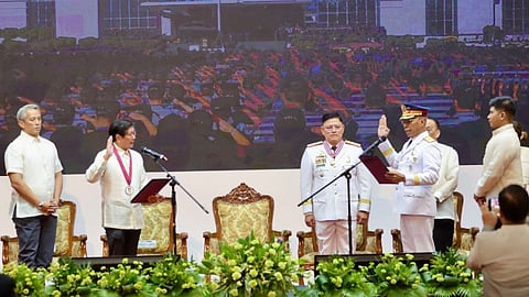 QUEZON CITY. General Nicolas Torre (right) takes his oath as the 31st chief of the Philippine National Police (PNP), administered by President Ferdinand Marcos Jr., succeeding then-PNP chief General Rommel Francisco Marbil during the change of command ceremony at Camp Brigadier General Rafael T. Crame, Quezon City, on June 2, 2025. (Photo courtesy of PNP)