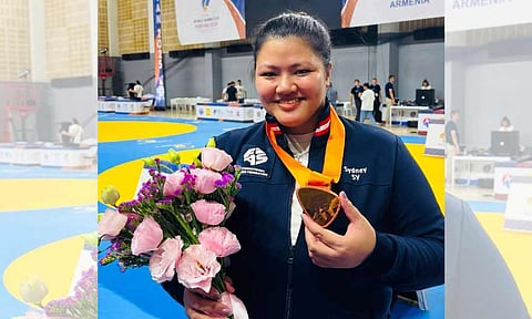 SAMBO STAR ON THE MOVE. Sydney Sy Tancontian of Davao City displays her bronze medal after placing third for the Philippines in the women’s +80kg division at the 2025 World Sambo Cup in Yerevan, Armenia, on June 8. The World No. 1 will now head to Switzerland for the International Athletes' Forum 2025, followed by a trip to Paris to defend her Grand Prix de Paris de Sambo title.