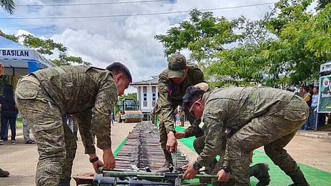 ZAMBOANGA. Troops of the 101st Infantry Brigade arrange the assorted firearms that were destroyed during the official declaration that Basilan as an Abu Sayyaf-Free province on Monday, June 9, 2025. The declaration was made during a multi-sectoral ceremony at the new provincial government center in Sta. Clara village, Lamintan City. (SunStar Zamboanga) 