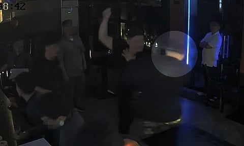 Screenshot of a CCTV footage involving Davao City First District Representative Paolo "Pulong" Duterte allegedly assaulting a man, later identified as 37-year-old businessman Kristone John Patria (encircled).